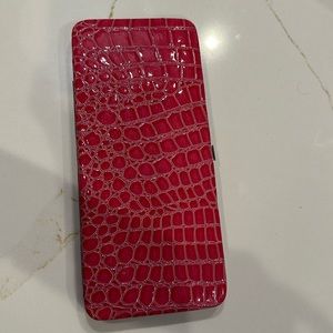 New with tags, pink wallet clutch.